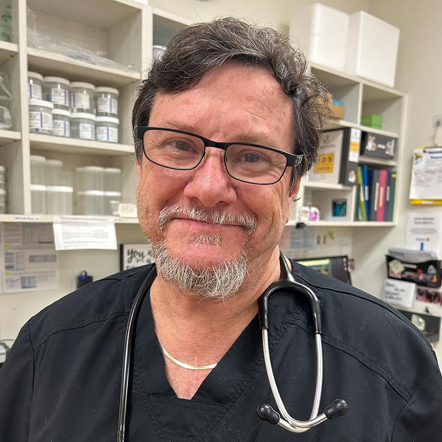 dr martin smiling in office
